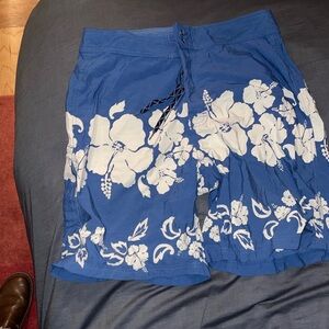 Patagonia Board Shorts Mens Size 36 Swim Trunks Pocket. Blue cream floral guc